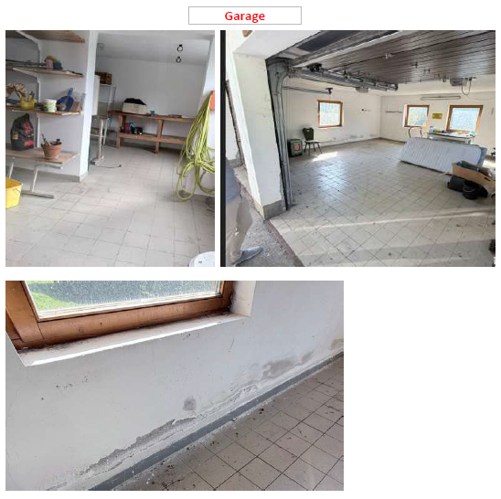 Garage mit Werkbank, Regalen und Garagentor, feuchte Wand mit Stockflecken